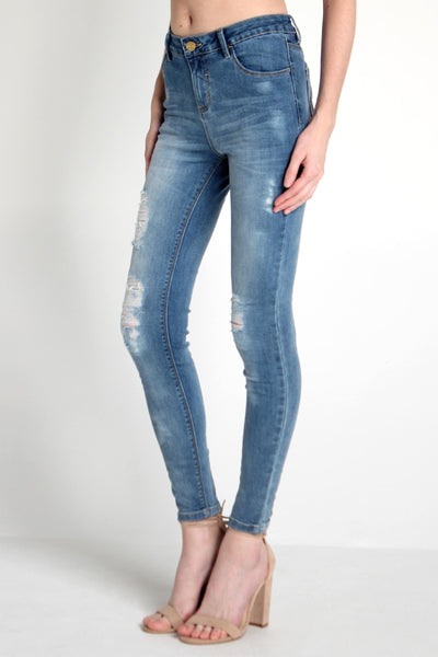 Mid Waist Jeans With Distressed Effect