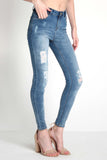 Mid Waist Jeans With Distressed Effect