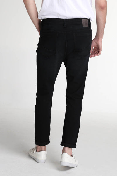Carrot Fit Jeans With Ripped And Repaired Detail