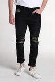 Carrot Fit Jeans With Ripped And Repaired Detail