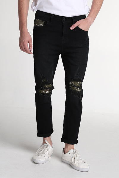 Carrot Fit Jeans With Ripped And Repaired Detail