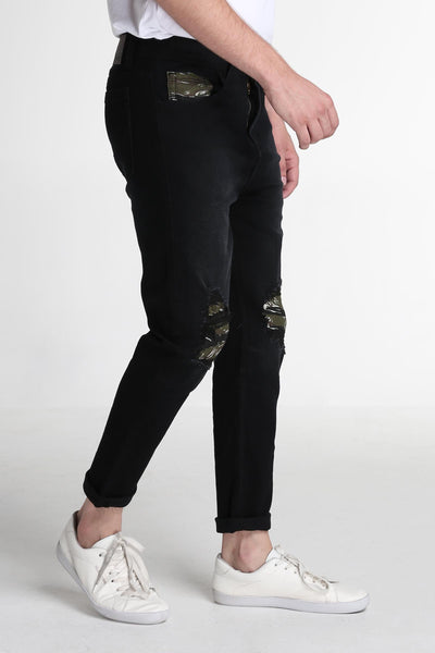 Carrot Fit Jeans With Ripped And Repaired Detail